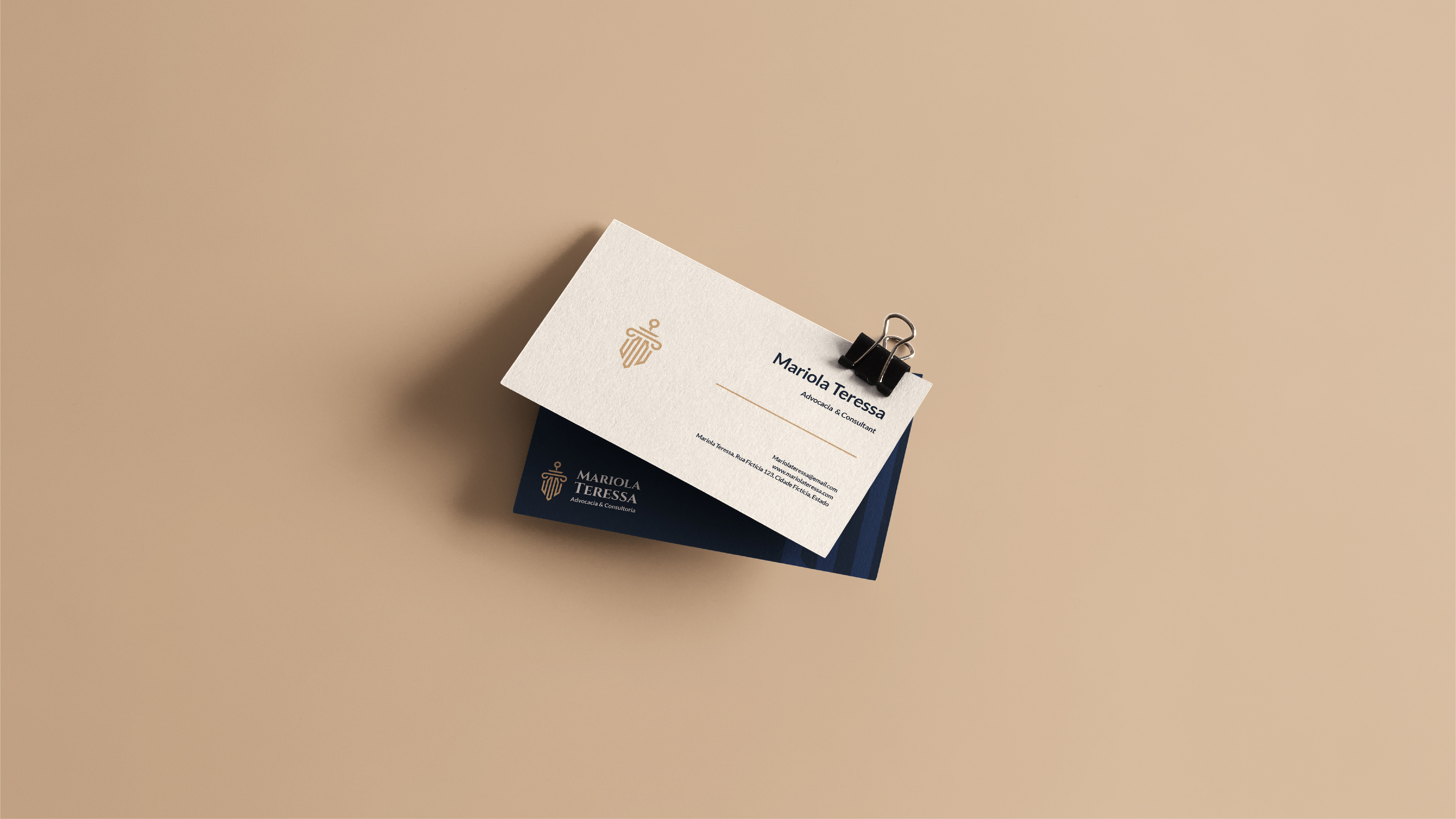 Stationery suite — business cards and letterhead on oak