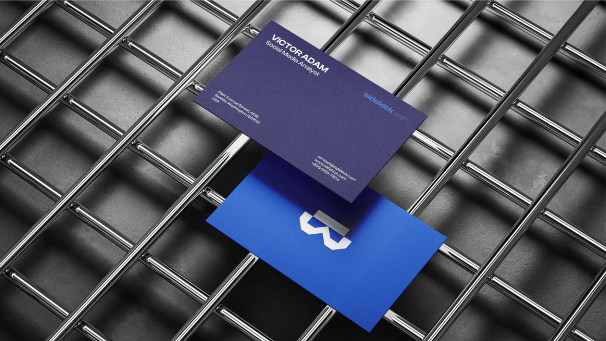 Business cards — electric blue over matte black grid